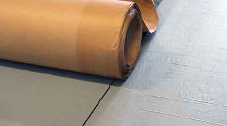 Roofing Membrane Creates Tight Seal Between Low-Slope System and Building: Mule-Hide Products Co.